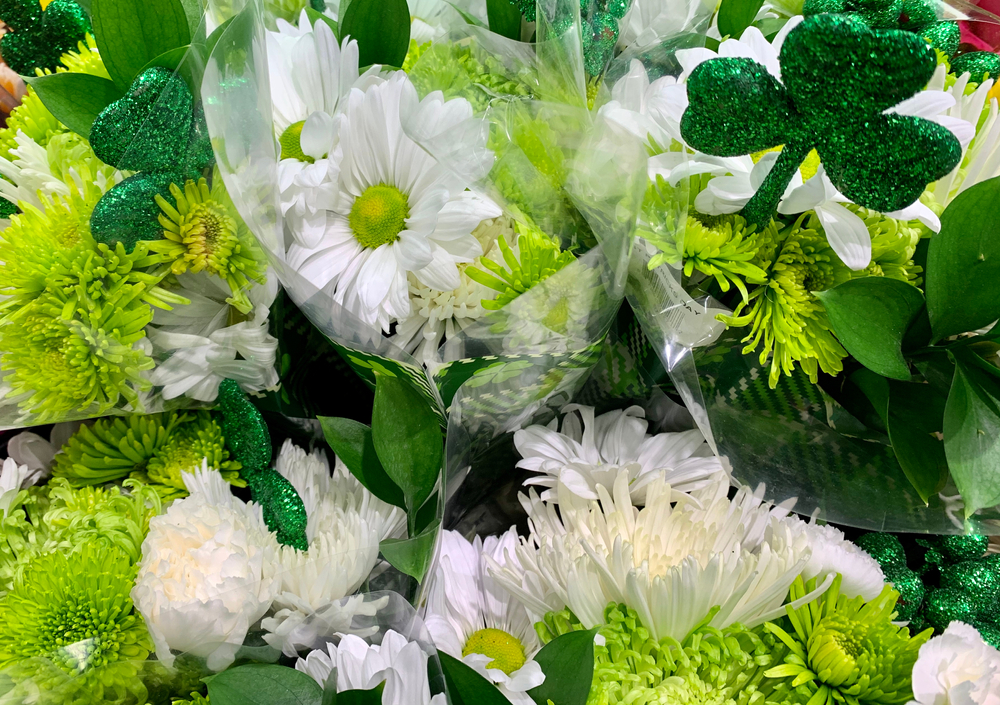St,Patrick,Day,Flowers.,Luck,Of,The,Irish,Background.,?? Inline image showing an elegant green and white floral arrangement with St. Patrick's Day accessories.