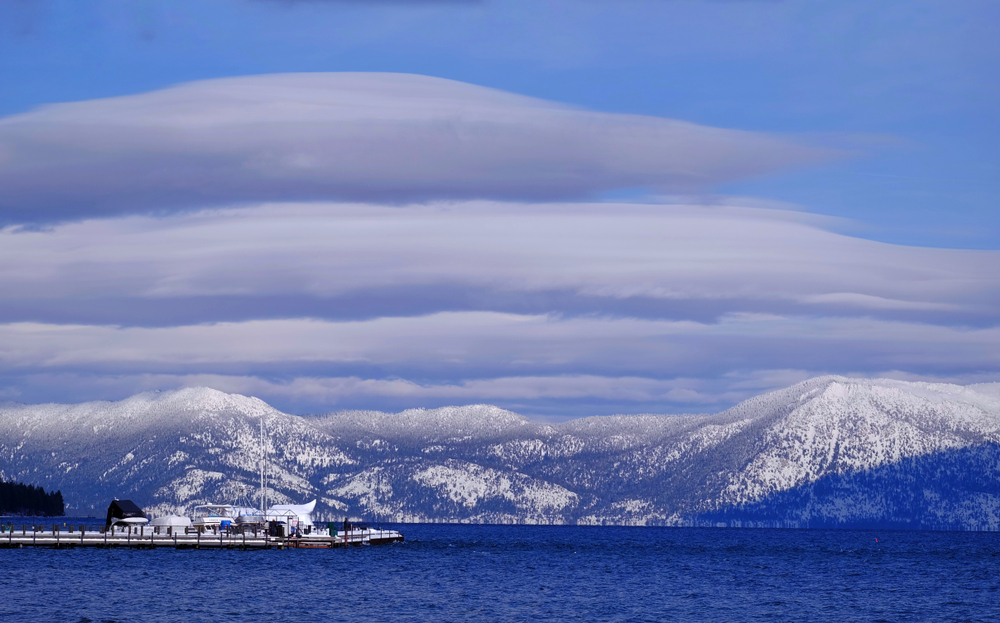 Tahoe City Featured image showing a winter view of Lake Tahoe and the Sierra Mountains from Tahoe city.