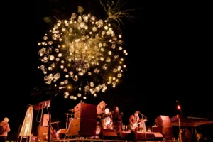 Winter fireworks light up the sky above a live outdoor concert during North Lake Tahoe Snowfest in Truckee Tahoe.